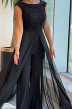 Korte mouwen tulle jumpsuit met textuur