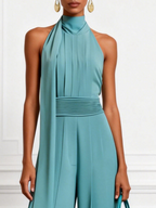 Blauwe Gerimpelde Halter Mock Neck Mouwloze Dressy Jumpsuit