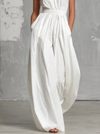 Witte Halter Nek Mouwloze Rugloze Jumpsuit